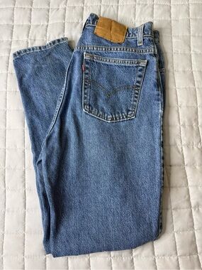 Vintage 90’s Levi's Women’s Light Blue Denim Tapered Jeans